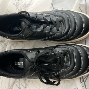 Michael Kors women’s Black and White Leather Sneakers